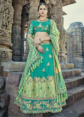 Teal embroidered silk semi stitched lehenga 1