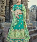 Teal embroidered silk semi stitched lehenga