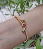 Golden and Pink Bracelets