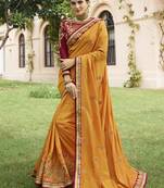 Mustard embroidered silk saree with blouse
