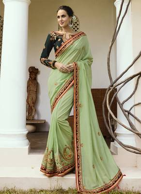 Light green embroidered silk saree with blouse 1