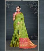 Green woven banarasi silk saree with blouse