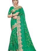 Green embroidered georgette saree with blouse