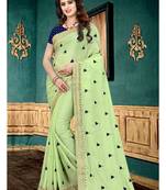 Light green embroidered georgette saree with blouse