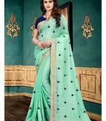 Sea green embroidered georgette saree with blouse