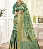 Sea green woven art silk saree with blouse