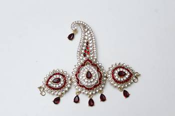 Red diamond brooch 1