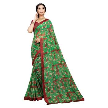Green printed georgette saree with blouse 1