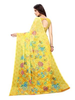 Yellow printed chiffon saree with blouse 4