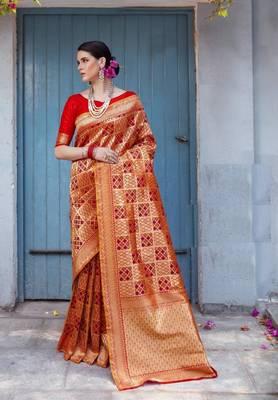 Orange woven banarasi saree with blouse 1