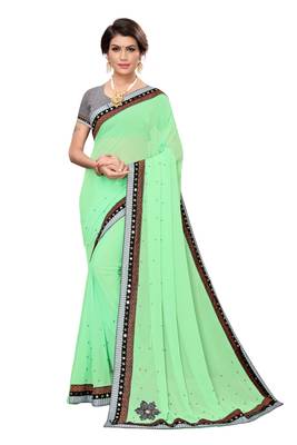 Green woven georgette saree with blouse 1