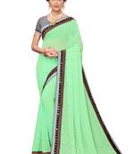Green woven georgette saree with blouse