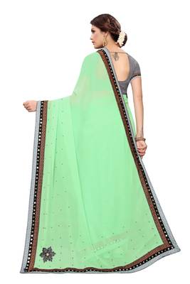 Green woven georgette saree with blouse 4