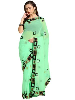 Green woven georgette saree with blouse 1