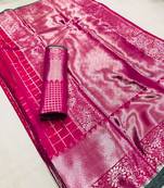 Pink woven silk blend saree with blouse