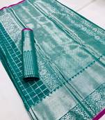 Green woven silk blend saree with blouse