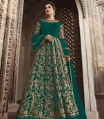 Turquoise embroidered net salwar