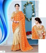 beige embroidered art silk saree with blouse