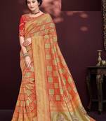 Beige woven banarasi silk saree with blouse
