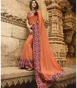 Orange printed georgette saree with blouse