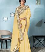 Yellow embroidered silk saree with blouse