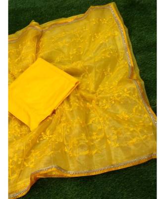 Yellow woven net saree with blouse 1