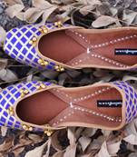 Blue woven leather juttis