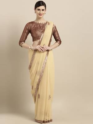 Cream embroidered georgette saree with blouse 1