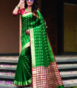 Dark green woven art silk saree with blouse
