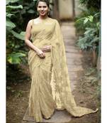 Cream woven net saree with blouse