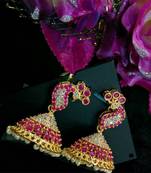 Gorgeous White And Red Colour Stones Peacock Jumkas