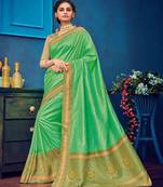   parrot green woven silk blend saree with blouse