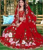 Red embroidered georgette saree with blouse