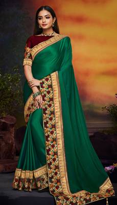 Dark green embroidered satin saree with blouse 1