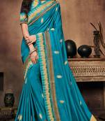 Aqua blue embroidered satin saree with blouse