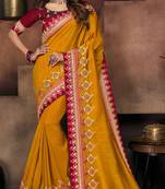 Mustard embroidered satin saree with blouse