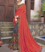 Orange embroidered georgette saree with blouse