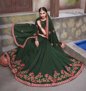 Dark green embroidered georgette saree with blouse 2