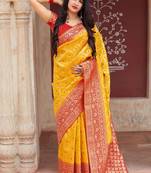 Yellow woven banarasi silk saree with blouse