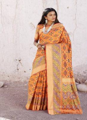 Orange woven silk blend saree with blouse 1