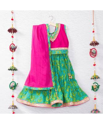 Printed Green Lehenga With Pink Tie Back Crop Top And A Beautiful Pink Dupatta 1