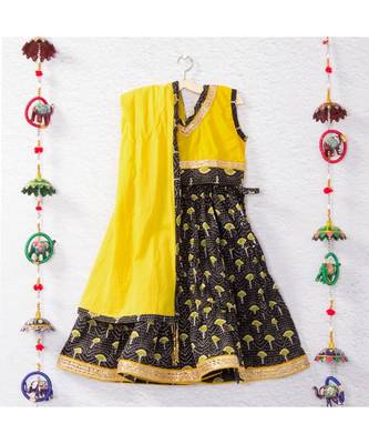 Printed Black Lehenga With A Yellow Tie Back Crop Top And Yellow Lehenga 1