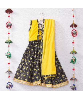 Printed Black Lehenga With A Yellow Tie Back Crop Top And Yellow Lehenga 2
