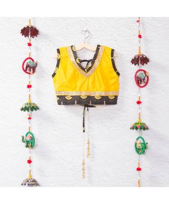 Printed Black Lehenga With A Yellow Tie Back Crop Top And Yellow Lehenga 3
