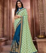 Green embroidered art silk saree with blouse