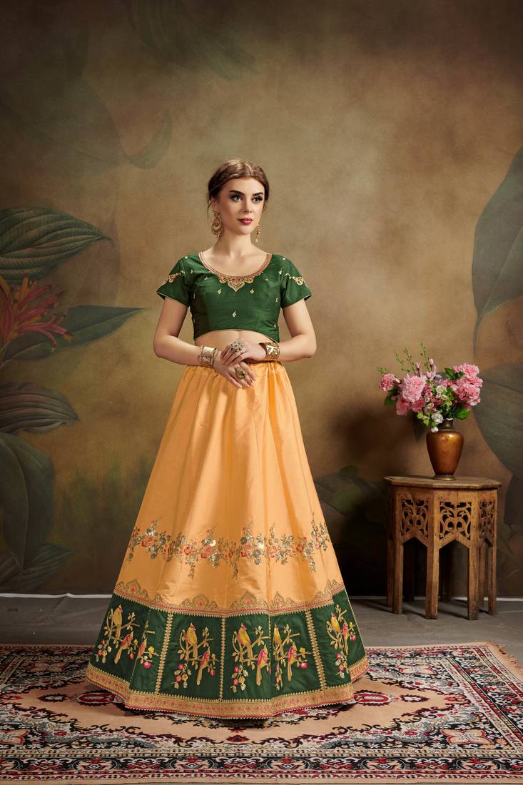 Peach Embroidered Silk Blend Semi Stitched Lehenga Choli