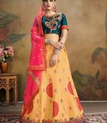 Mustard Embroidered Silk Blend Semi Stitched Lehenga Choli