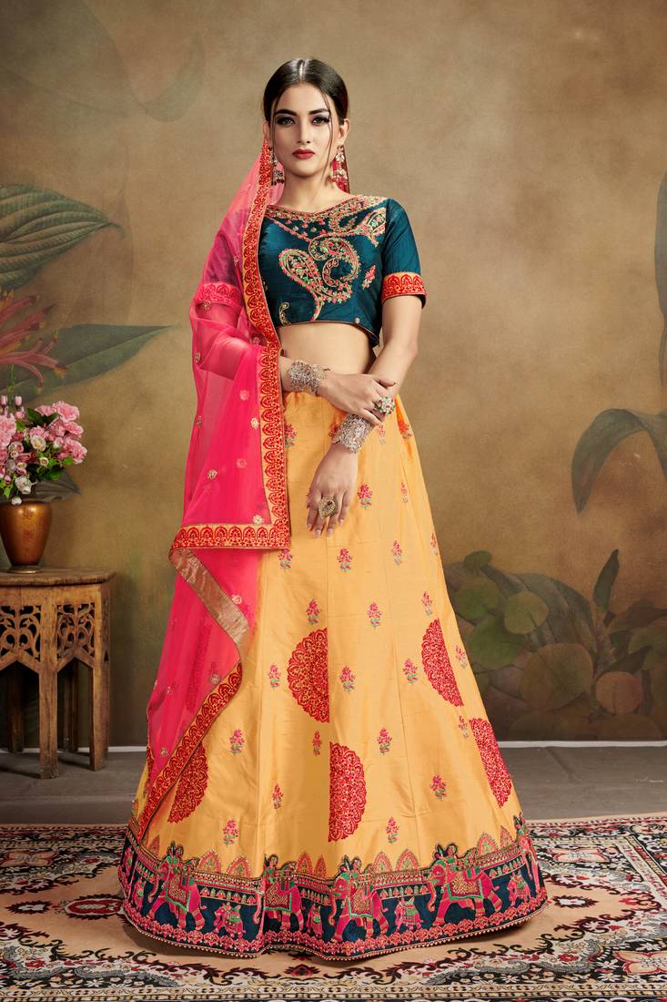 Mustard Embroidered Silk Blend Semi Stitched Lehenga Choli
