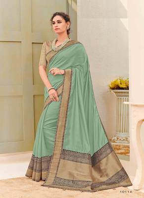   sea green woven silk blend saree with blouse 1