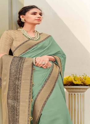   sea green woven silk blend saree with blouse 2